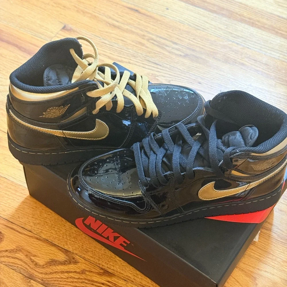 Jordan High-Top Sneakers in Black and Gold